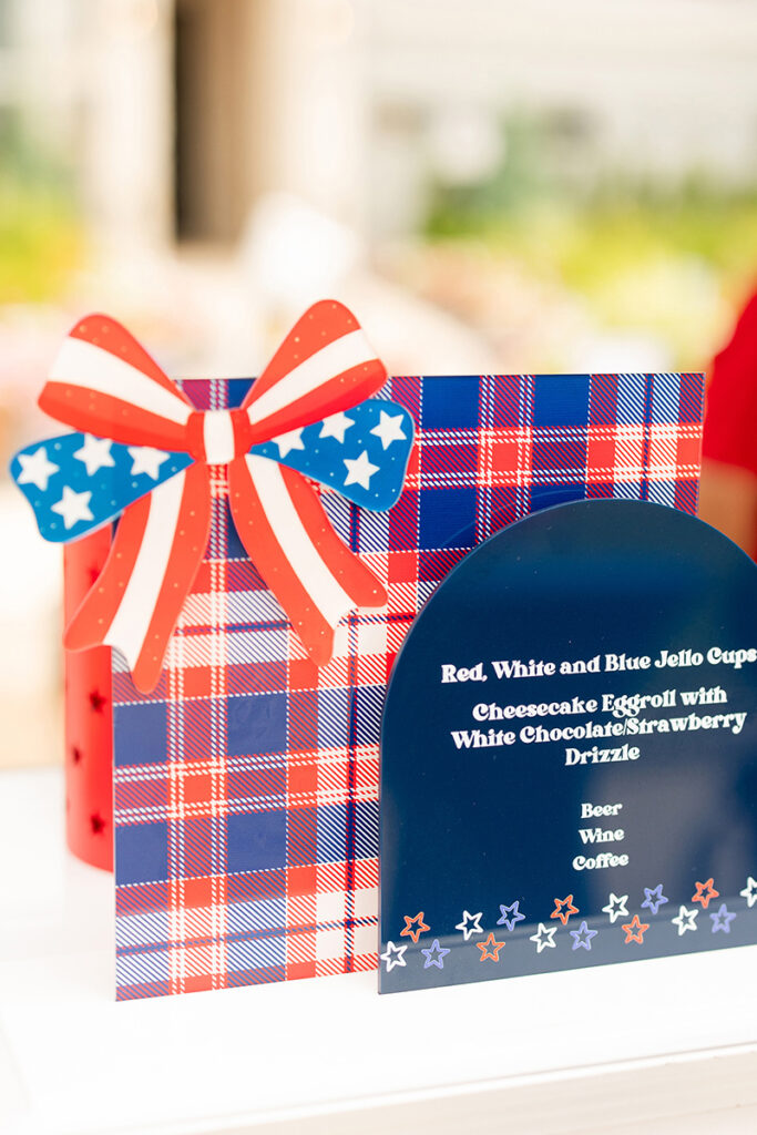 Patriotic plaid sign with a star-spangled bow, for Brookewater event near Richmond TX.