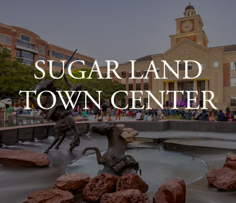 Bronze horse statues in a fountain at Brookewater, a vibrant master-planned community.